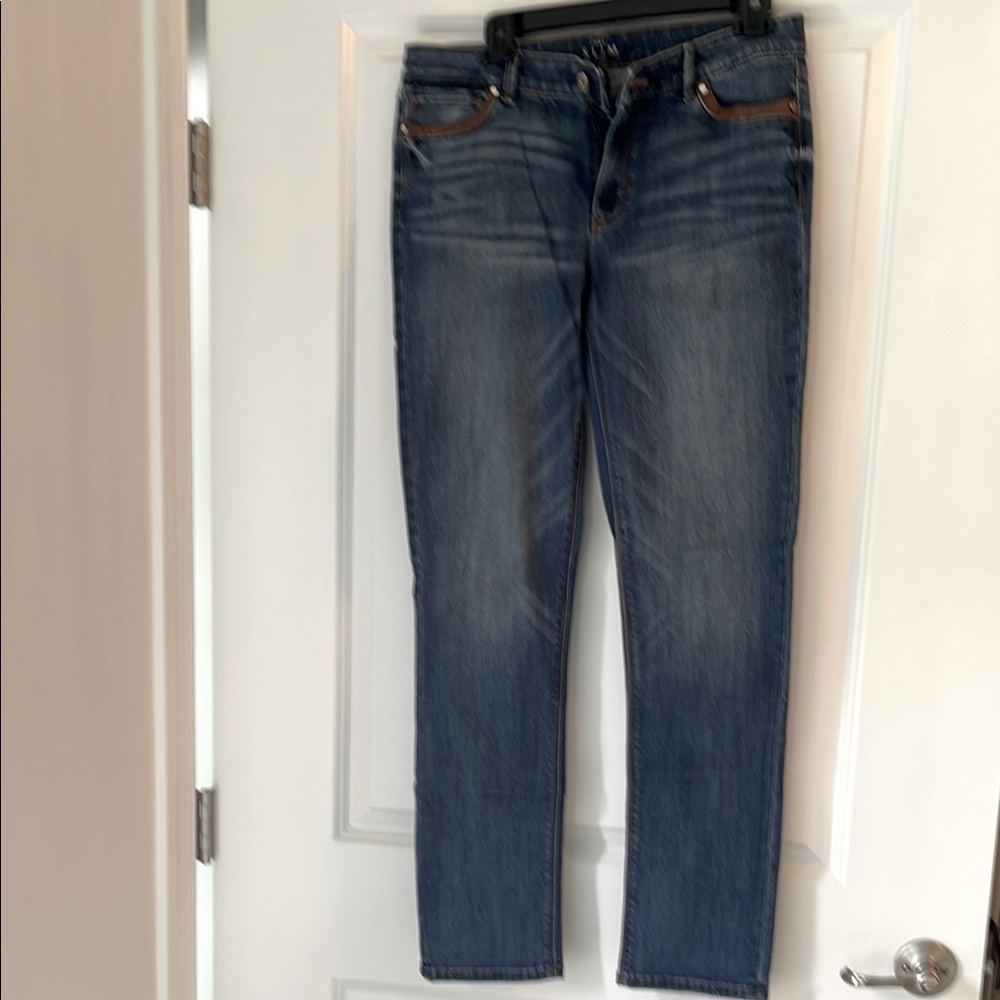 White House Black Market slim women’s leather accented jeans.